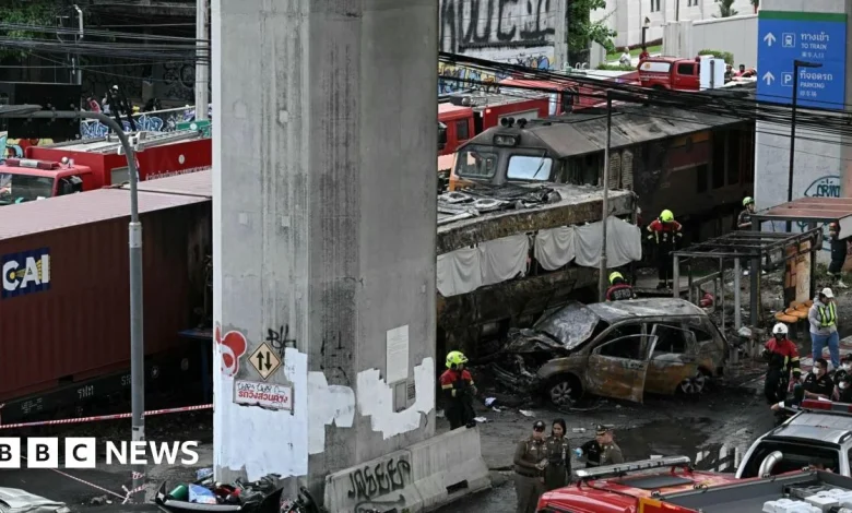 Freight train and bus crash kills at least eight in Bangkok