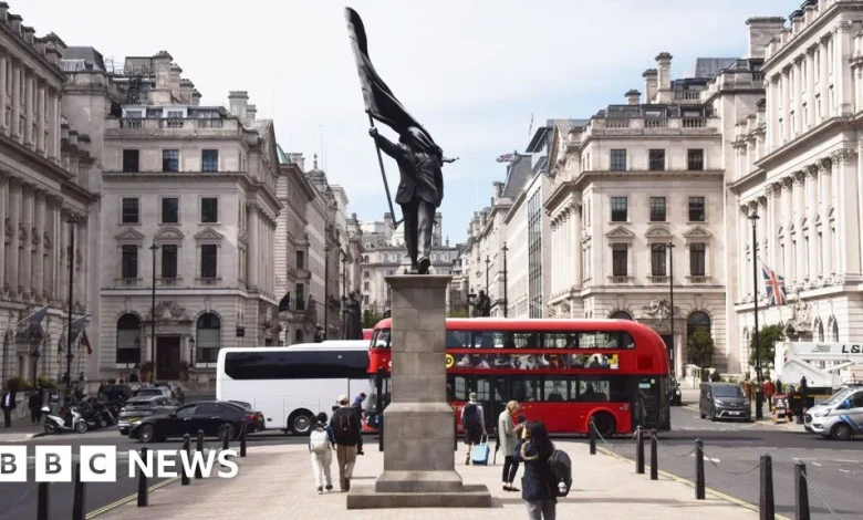 How did Banksy put up a statue in central London?