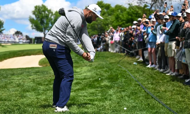 Jon Rahm apologizes as divot from angry swing hits volunteer