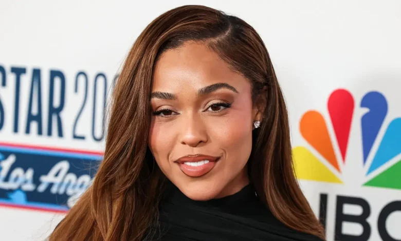 Jordyn Woods Flexes Custom Karl-Anthony Towns Jacket Before Knicks-Cavaliers Game 1