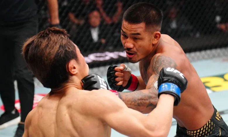 Joshua Van retains UFC flyweight title with TKO of Tatsuro Taira