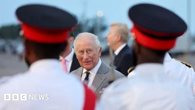 King arrives in Bermuda after ending US trip with visit to small town America