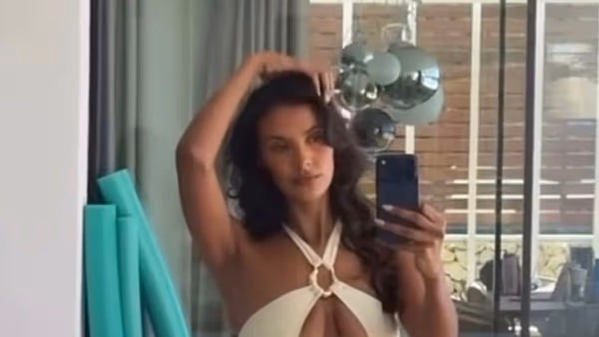 Love Island Maya Jama's curves unleashed by skin tight swimsuit with giant hole on chest