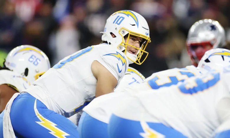Mike McDaniel hopes to get QB Justin Herbert to "own the position" in a way he never has