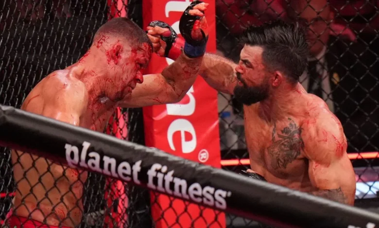 Mike Perry batters, bloodies Nate Diaz into corner stoppage