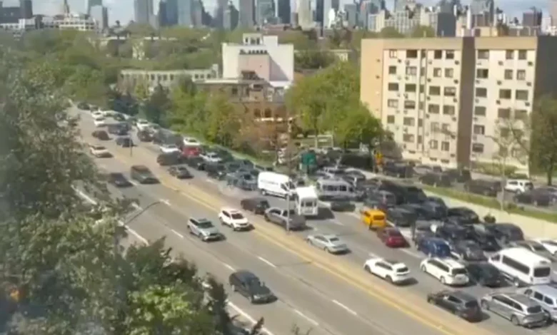 Nail-biting video shows reckless NYC drivers go wrong way on highway to dodge Five Boro Bike Tour traffic