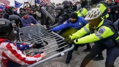 Officers who defended Capitol from rioters sue to block payouts from fund : NPR