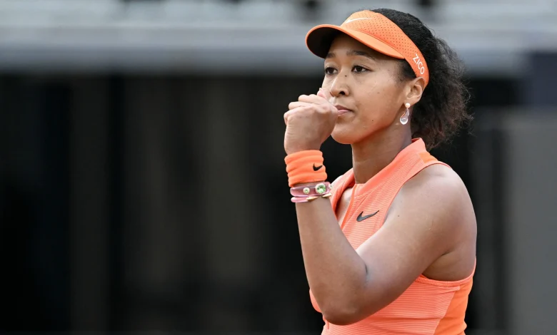 Osaka regroups against inspired Lys to reach Rome third round