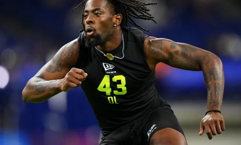 Patriots draft pick charged with domestic assault