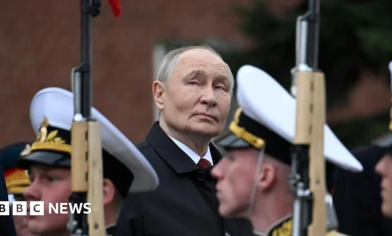 Putin denounces Nato at scaled back Victory Day parade