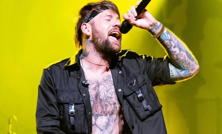 Rock star's wife ends 14-year marriage after singer comes out as 'proudly gay man'