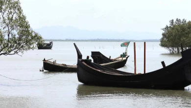 Rohingya take to sea as UN food aid cuts hit Bangladesh refugee camps