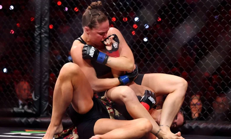 Ronda Rousey submits Gina Carano by armbar in 17 seconds