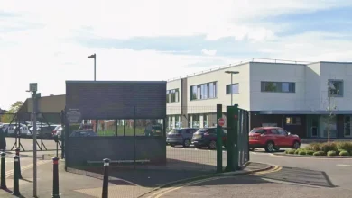 School plunges into lockdown with pupils 'hiding under desks' as police race to scene