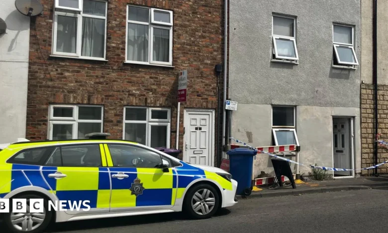 Three people taken to hospital after house fire