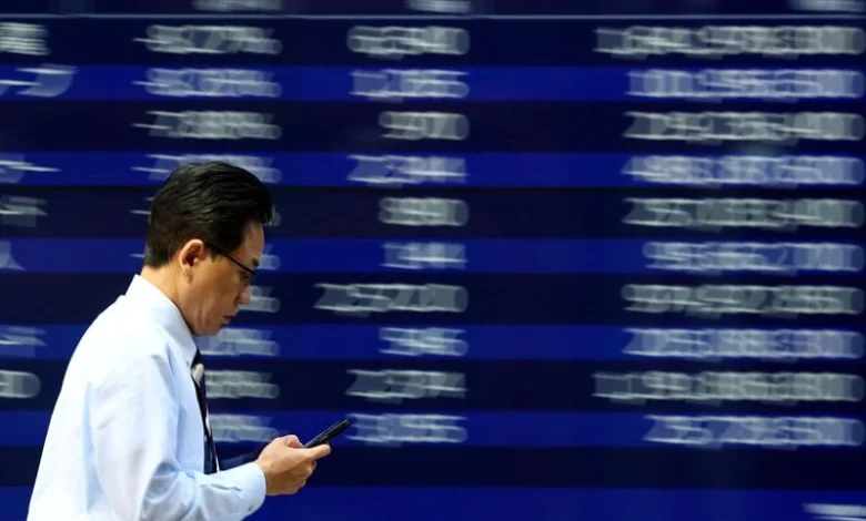Tokyo stocks hit record, oil and dollar ease on Middle East peace hopes