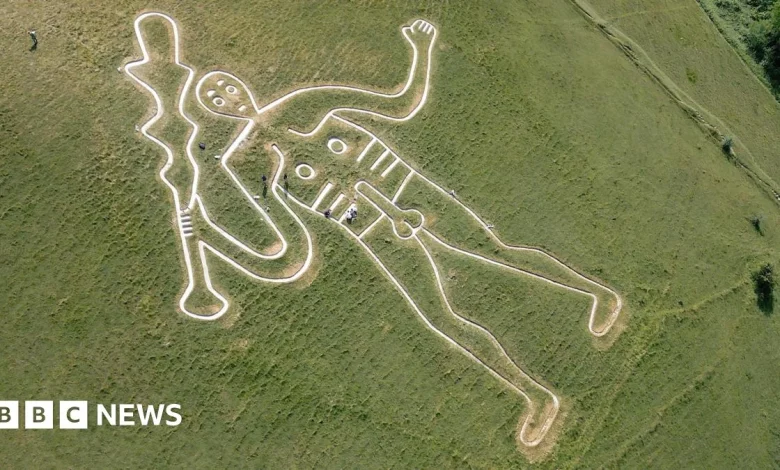 UK's rudest chalk figure gets a glow-up to stop it fading in the rain