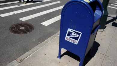 US Postal Service suspends non-essential spending amid cash crunch