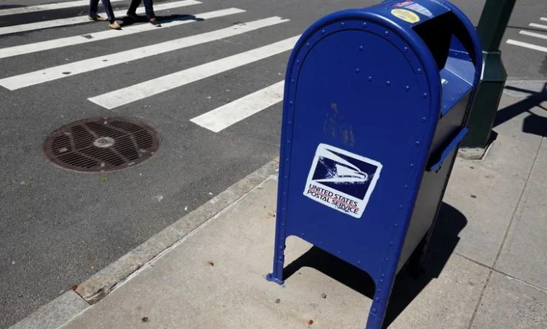 US Postal Service suspends non-essential spending amid cash crunch