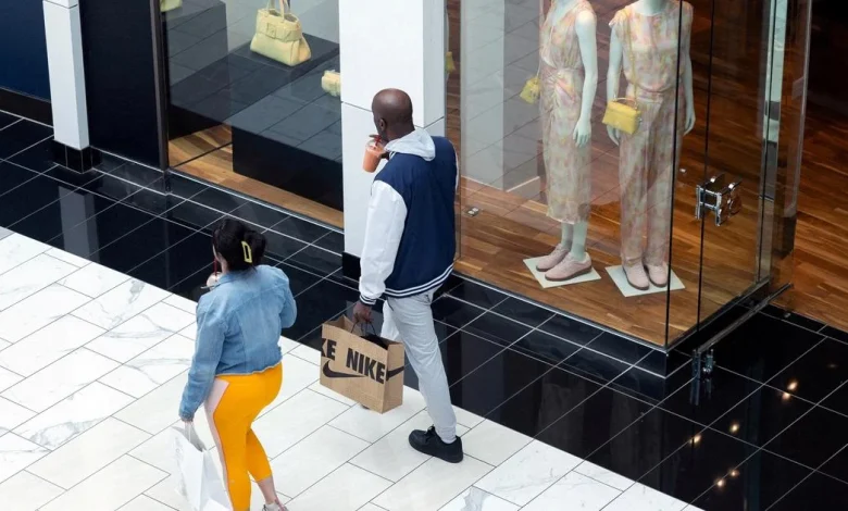 US consumer sentiment falls as Dow hits record