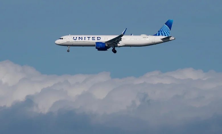 United flight rerouted after passenger tries to open door at 36,000 feet