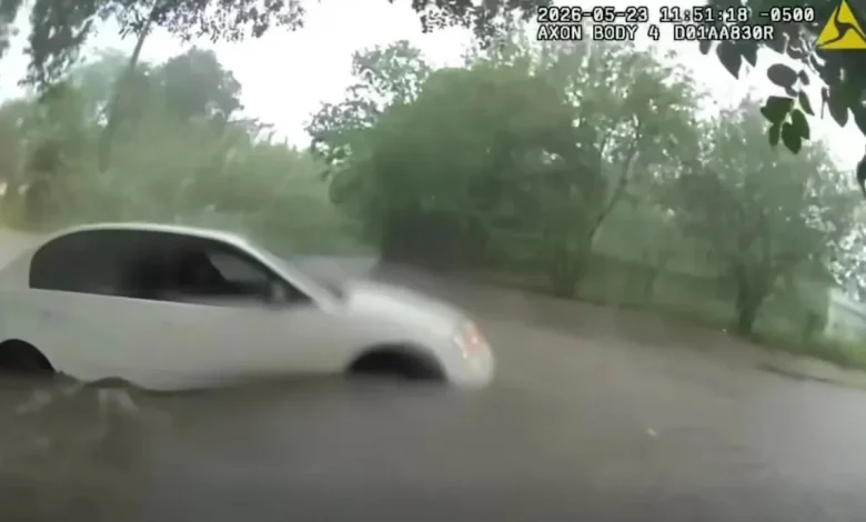 Video shows infant being rescued from car trapped in Texas floodwaters
