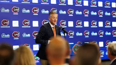 What Florida Gators AD Scott Stricklin said about softball not shaking hands, CFP format