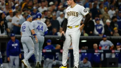 Wild throw in ninth inning allows Dodgers to even series with Padres