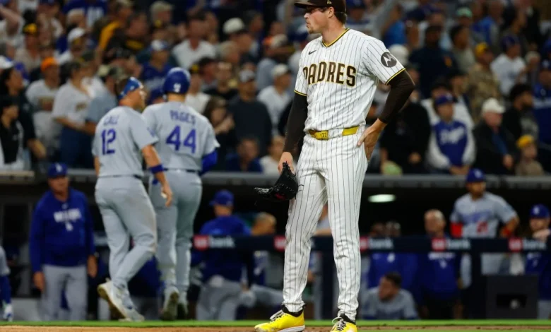 Wild throw in ninth inning allows Dodgers to even series with Padres
