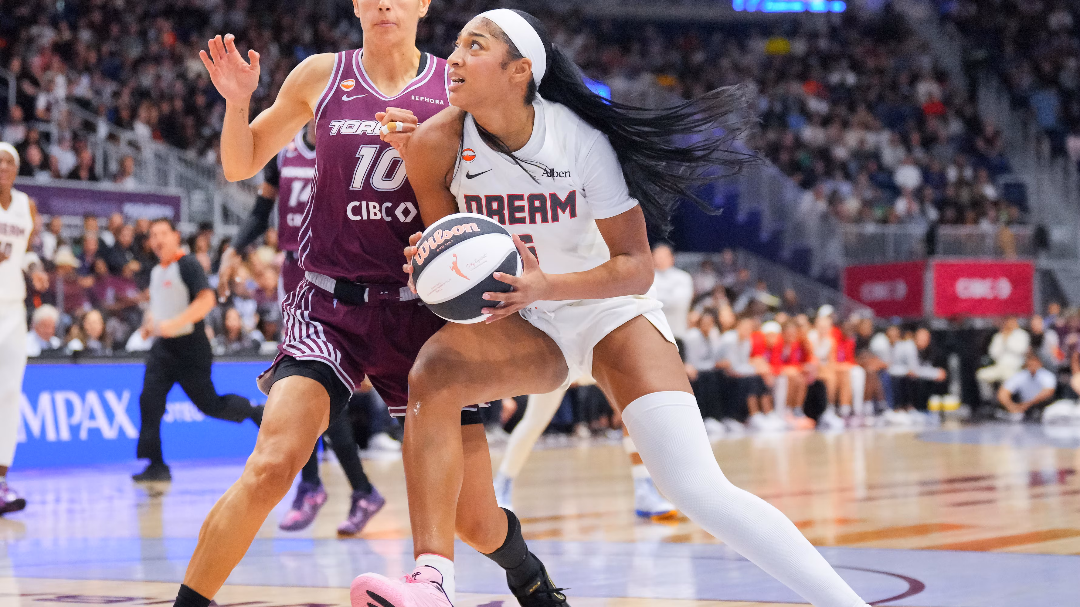 Angel Reese Tackled, Isabelle Harrison Ejected in Video of WNBA Scuffle During Dream vs. Tempo
