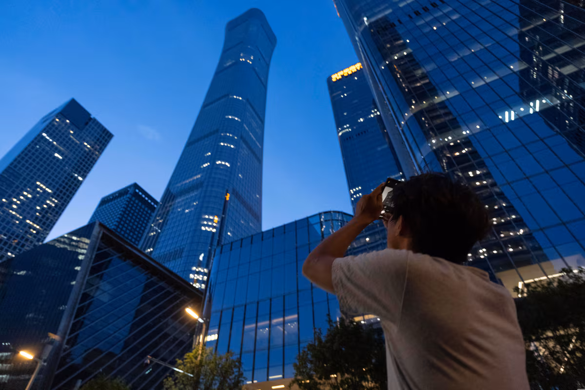 Beijing’s tallest building damaged after small airplane reportedly crashes into it