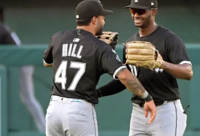 Chicago White Sox trade Derek Hill and international bonus money to Philadelphia for prospects