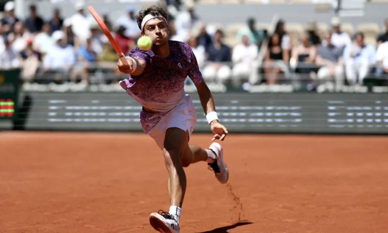 Cobolli fights into French Open last eight against dogged Svajda
