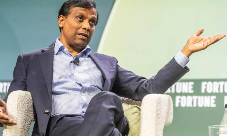 Cognizant CEO is swimming against the tide on AI: he's hiring over 20,000 graduates this year and says AI tokenmaxxing is a 'vanity metric'