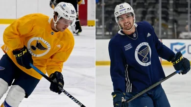 Dean, Peterson sign one-year extensions