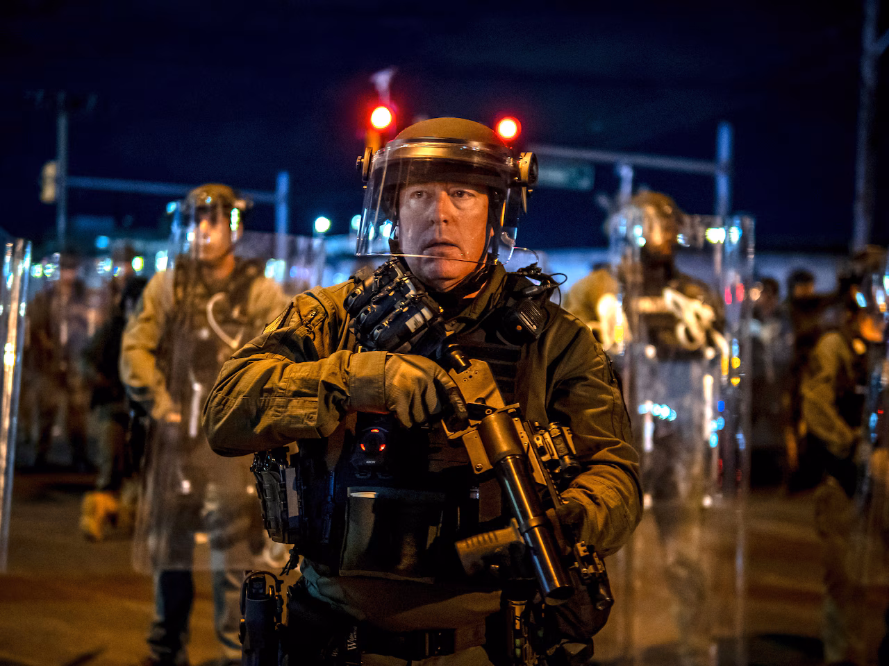 Delaney Hall protesters arrested as riot police storm streets. Chaos continues as curfew begins.