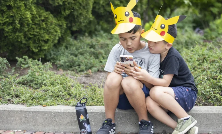 Fans reminisce as kids set out on mission to 'catch 'em all' at Pokémon GO fest