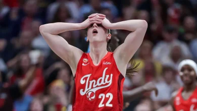 Fever's Caitlin Clark throws up near bench before second half against Dream