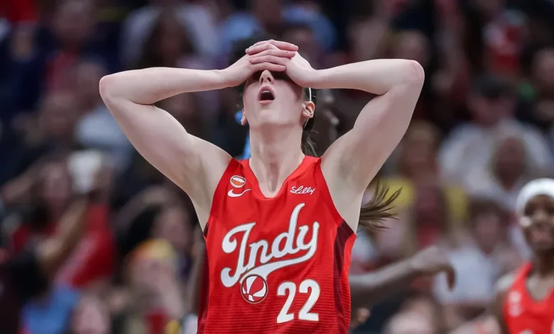 Fever's Caitlin Clark throws up near bench before second half against Dream