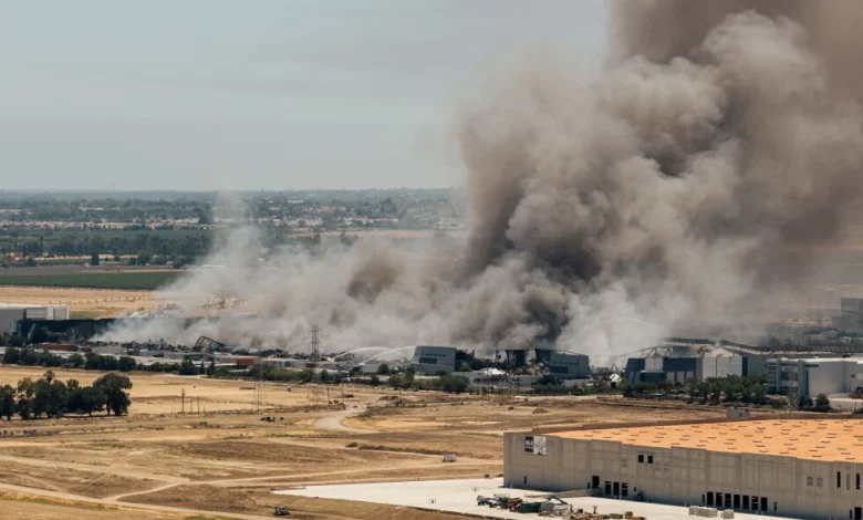 Firefighters battle huge Tracy, California, medical equipment warehouse fire for 3rd day