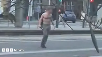 Four in hospital after bare-chested man with weapon roams around Edinburgh