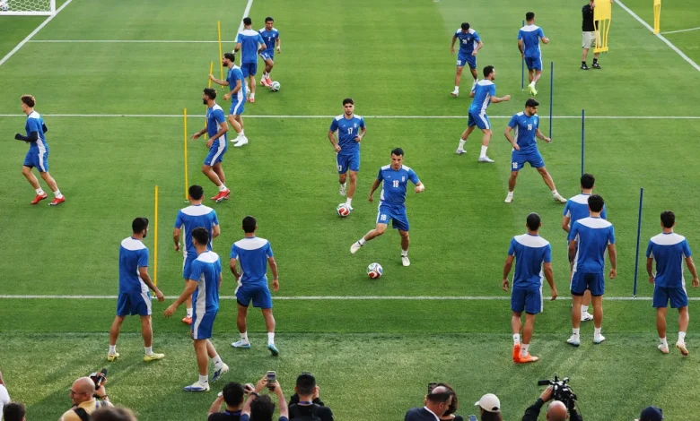 From The Sports Desk: One day after peace agreement, Iran takes field for World Cup
