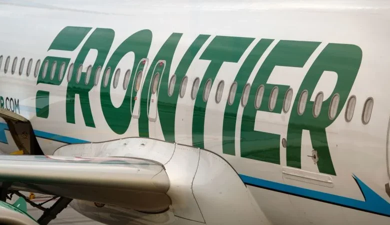 Frontier passenger chokes off-duty flight attendant after trying to open exit door and cockpit on Chicago flight, police say
