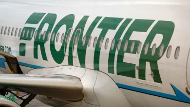 Frontier passenger chokes off-duty flight attendant after trying to open exit door and cockpit on Chicago flight, police say