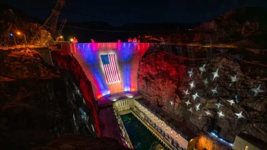 Hoover Dam, challenged by drought, now wears a U.S. flag the size of a football field