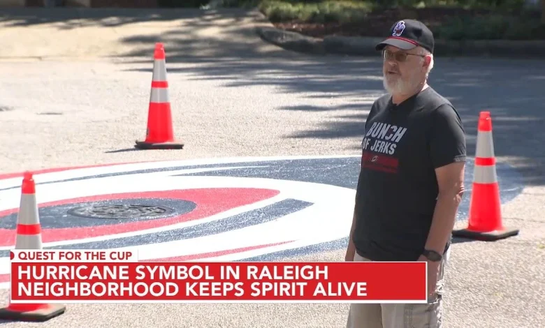 Hurricanes logo painted on street a sign of Raleigh neighborhood's fandom