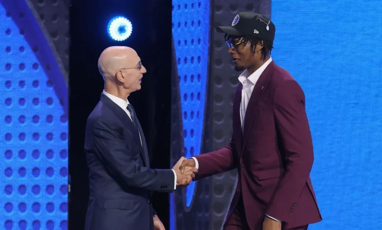 Johnson reunites with Mavs' May, leads U-M trio in draft lottery