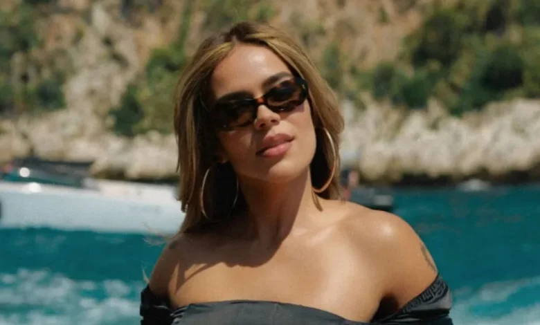 Karol G shows her abs while soaking up the Formula 1 atmosphere in Monaco