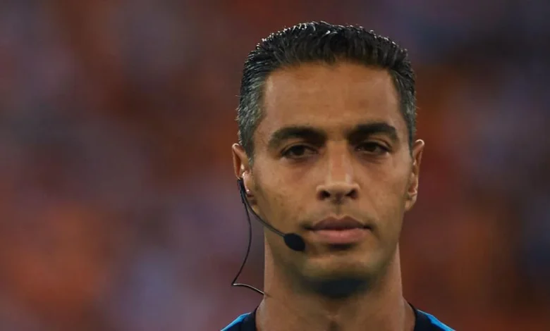 Lawyer referee warms up for World Cup debut