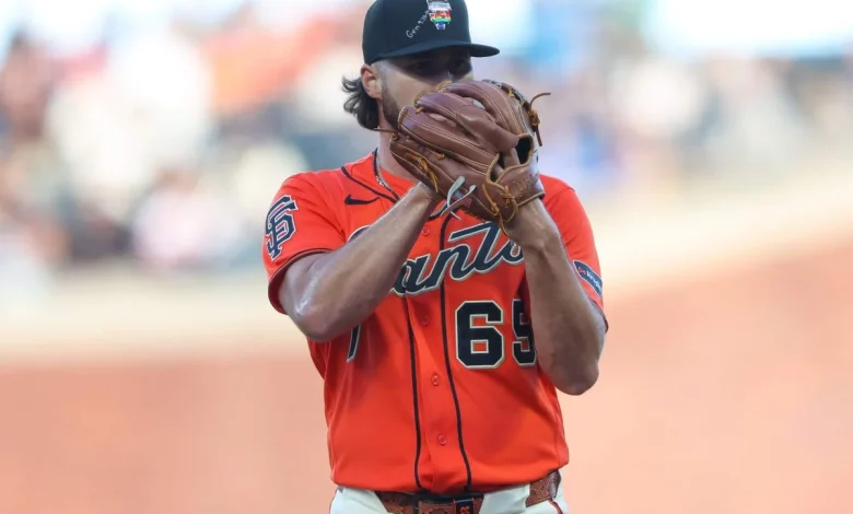 MLB issues warning to Giants pitchers who wrote Bible verses on Pride Night caps
